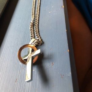 Silver cross and necklace.